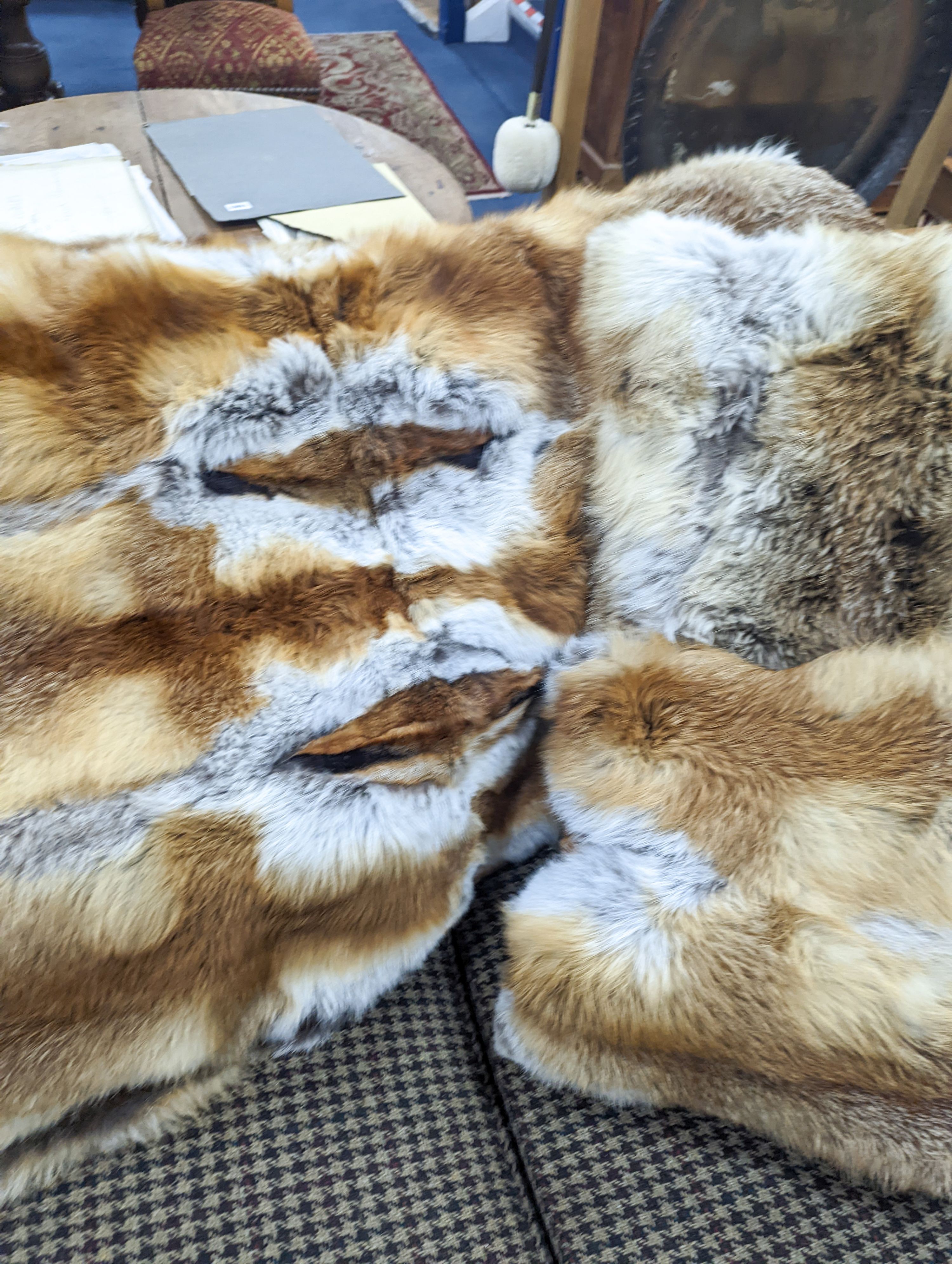 A German red fox fur throw with cashmere and wool back 180 x 135 cms and two red fox fur cushions.